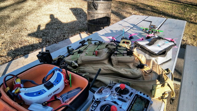 Quadcopter Flying Gear Spread Out On A Picnic Table