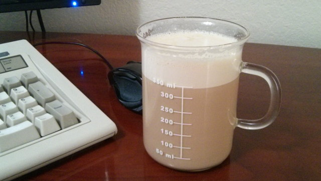 A latte in my laboratory beaker mug