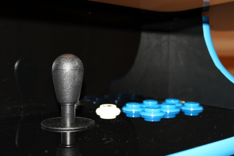 Arcade cabinet joystick close up