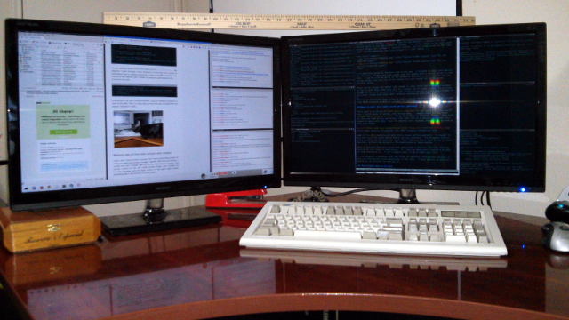 Two QNIX QX2710 monitors under a yardstick