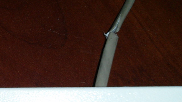 Cut jacket near base of the cable
